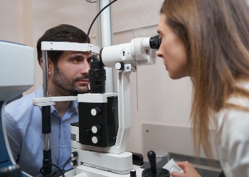 oculist performing eye examination with slit lamp 2021 12 15 20 28 41 utc